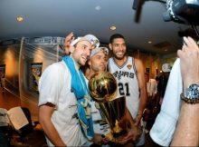 Manu Ginobili, Tony Parker and Tim Duncan of the San Antonio Spurs celebrate with the Larry O'Brien trophy after defeating the Miami Heat to win the 2014 NBA Finals in Game Five of the 2014 NBA Finals on June 15, 2014 at AT&T Center in San Antonio. Credit: Jesse D. Garrabrant/NBAE/Getty Images